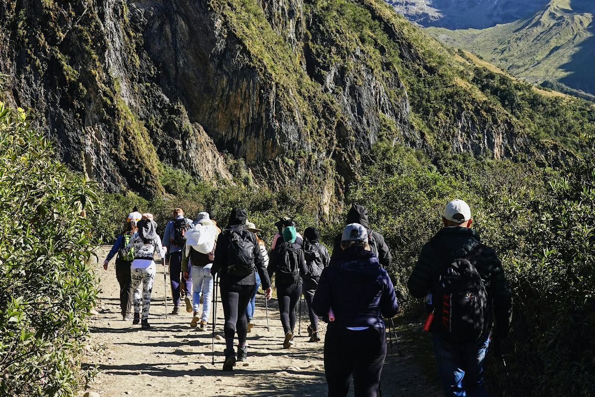 A group hiking a mountain trail